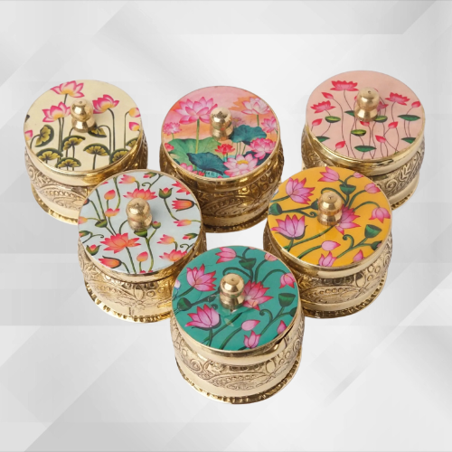 Handcrafted brass kumkum holder with pichwai-style floral design and colorful enamel work – traditional Indian pooja accessory