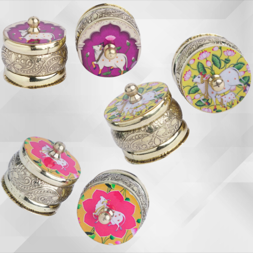 Brass kumkum box with decorative floral artwork – perfect for Varalakshmi Vratham and wedding return gifts