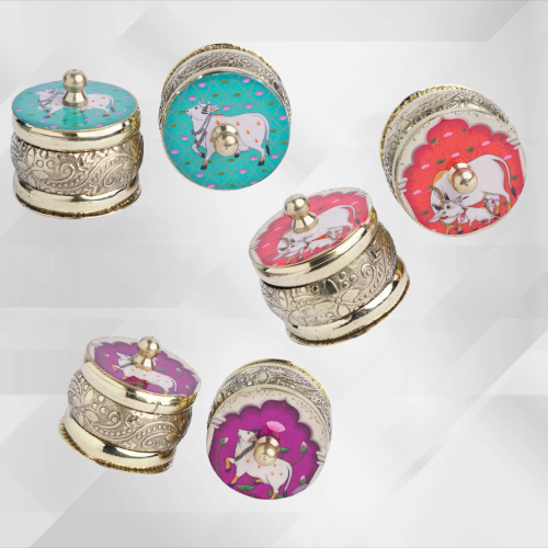 Assorted brass kumkum holders in pastel enamel motifs – traditional thamboolam return gifts