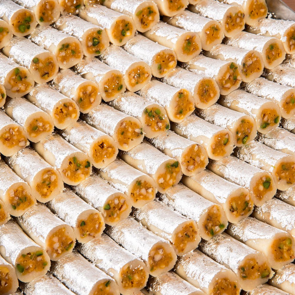 Premium Kaju Pista Roll mithai with pista stuffing inside kaju katli
